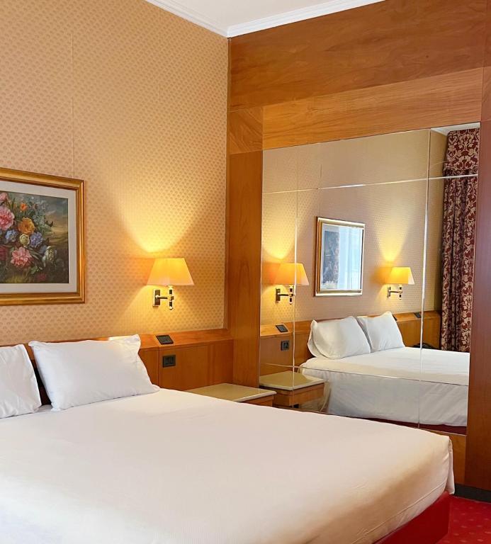 Postel nebo postele na pokoji v ubytování Hotel Motel Top