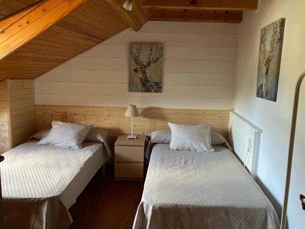 Postel nebo postele na pokoji v ubytování El Cau de Cal Quimet
