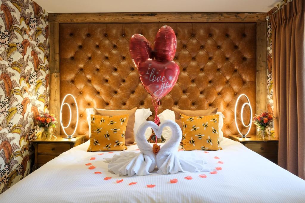 Postel nebo postele na pokoji v ubytování Grange Boutique Hotel