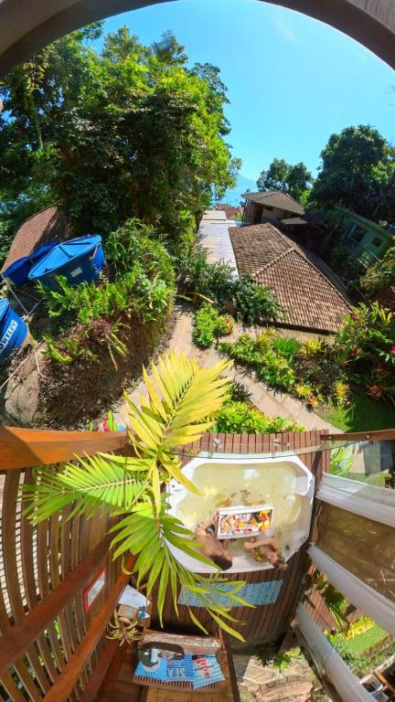 Um jardim em Pousada Bela Vista