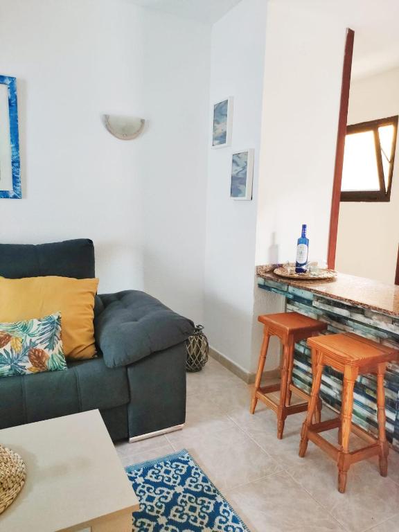 A seating area at Guinea Nidive apartment