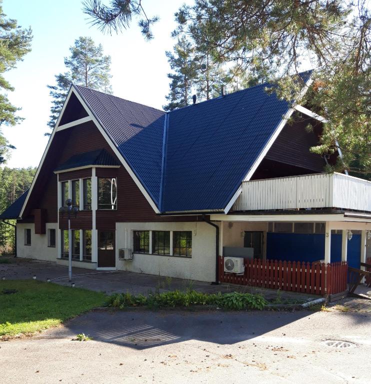 a house with a solar array on its roof at Jaalan Tienristi in Kouvola