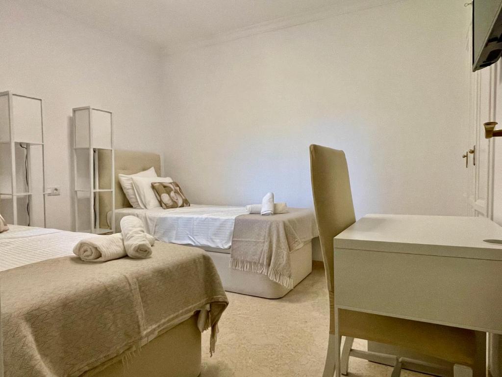 Posteľ alebo postele v izbe v ubytovaní Royal Pearl Marbella