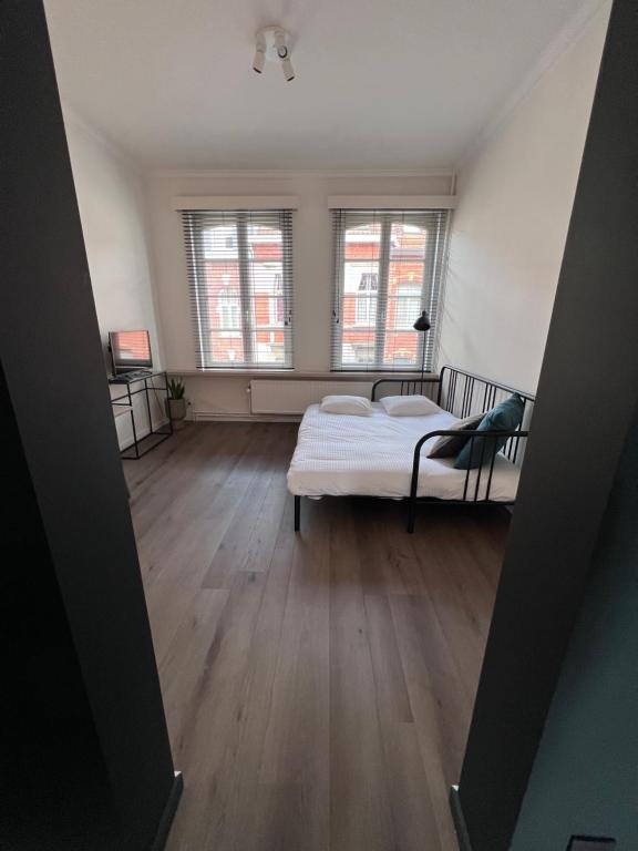 Postel nebo postele na pokoji v ubytování Maison Georges