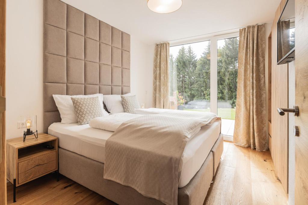 Postel nebo postele na pokoji v ubytování Granit Appartements