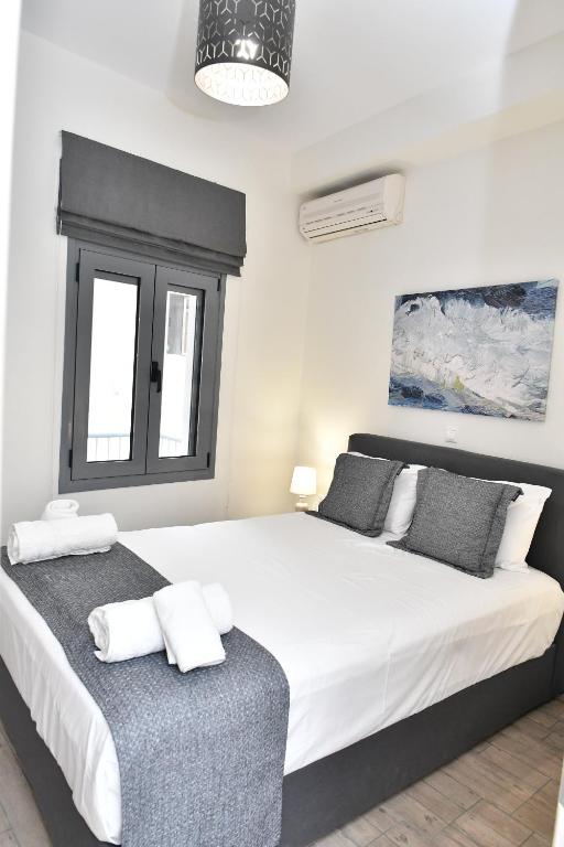 Кровать или кровати в номере Michaela's guesthouse