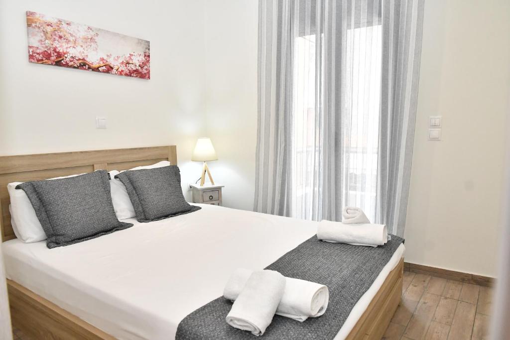 Кровать или кровати в номере Michaela's guesthouse