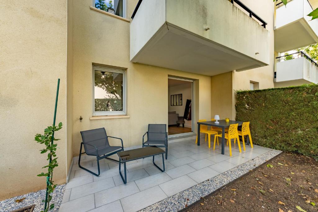 Patio alebo iná vonkajšia časť ubytovania L'Instant Pause Détente