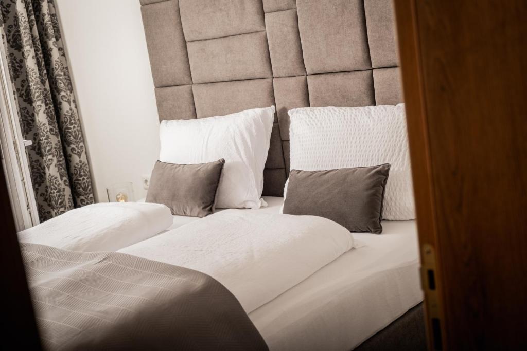 Postel nebo postele na pokoji v ubytování Granit Appartements