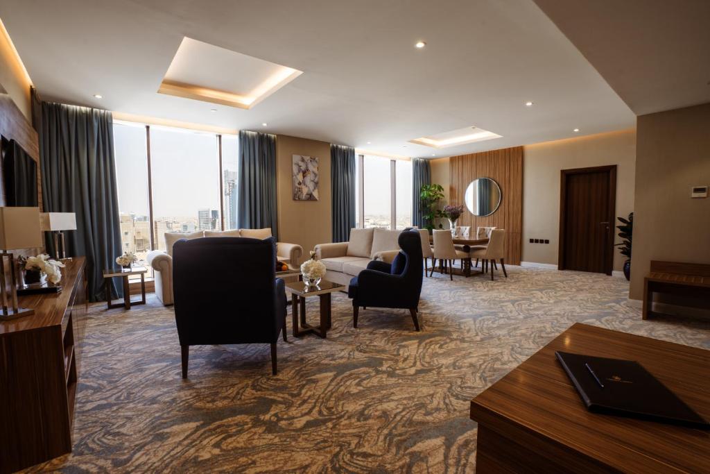 TV a/nebo společenská místnost v ubytování Cantonal Hotel by Warwick