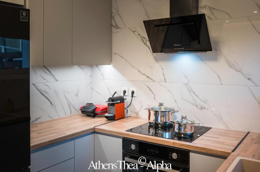 Kuchnia lub aneks kuchenny w obiekcie AthensThea Alpha Luxury Penthouse Apt in Omonia