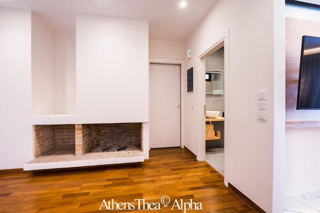 Telewizja i/lub zestaw kina domowego w obiekcie AthensThea Alpha Luxury Penthouse Apt in Omonia