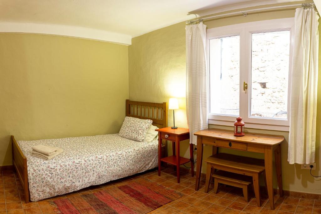 Postel nebo postele na pokoji v ubytování SidroAndCo Rural Home