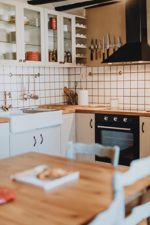 Kuchyň nebo kuchyňský kout v ubytování SidroAndCo Rural Home