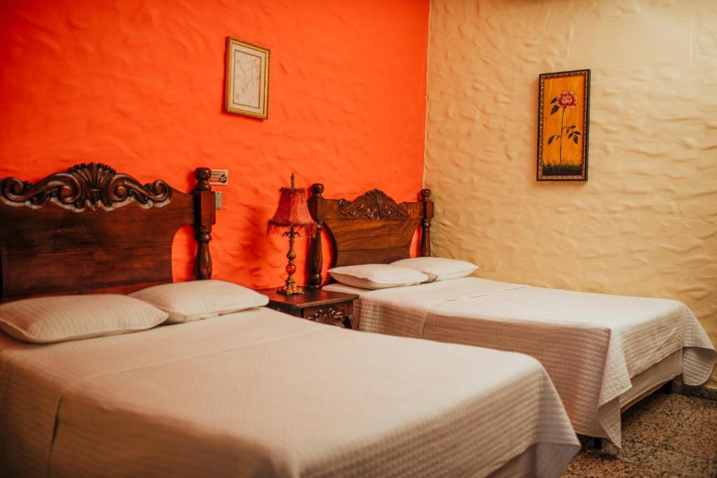 Postel nebo postele na pokoji v ubytování Hotel Condesa