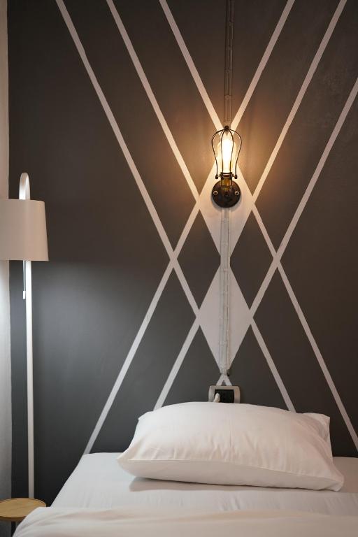 Postel nebo postele na pokoji v ubytování Chillax Khaosok Hostel - SHA Certified