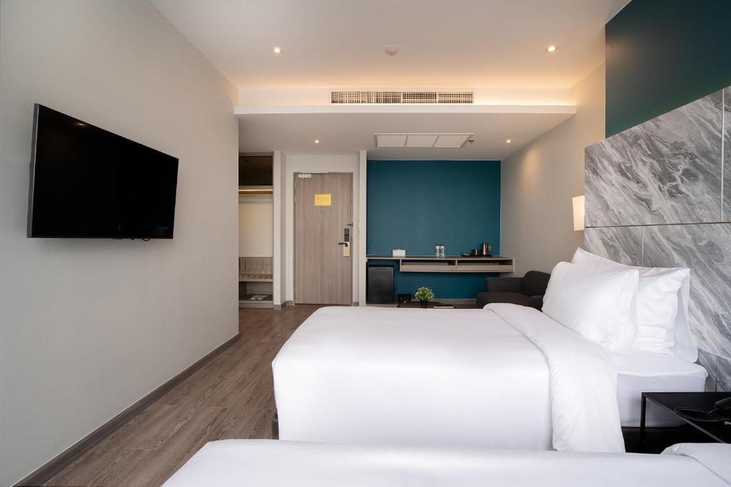 TV a/nebo společenská místnost v ubytování Thaya Hotel Bangkok