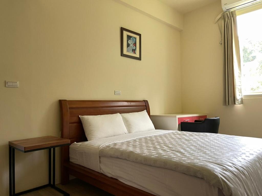 Postel nebo postele na pokoji v ubytování Taomi 5211 B&B