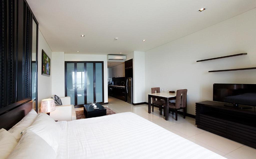 Giường trong phòng chung tại Luxury Seaview Apartments managed by Anh