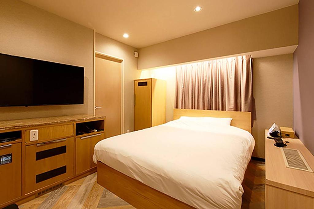 TV a/nebo společenská místnost v ubytování Think・Hotel・Think
