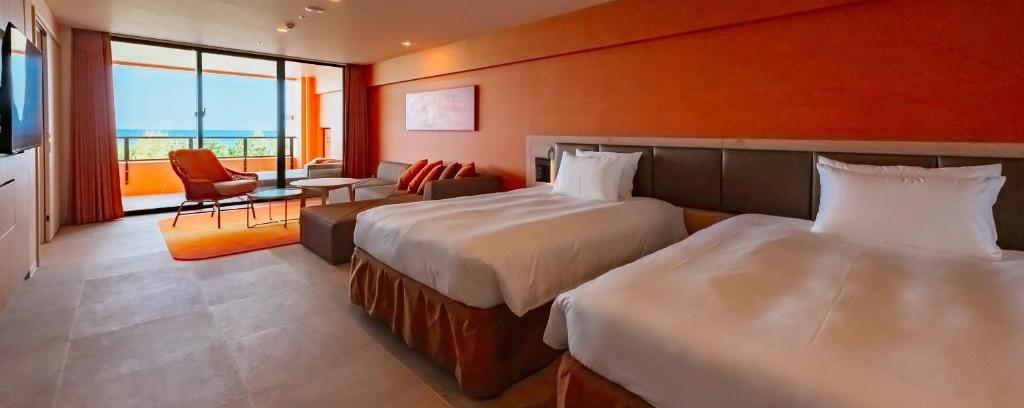 Postel nebo postele na pokoji v ubytování AQUASENSE Hotel & Resort