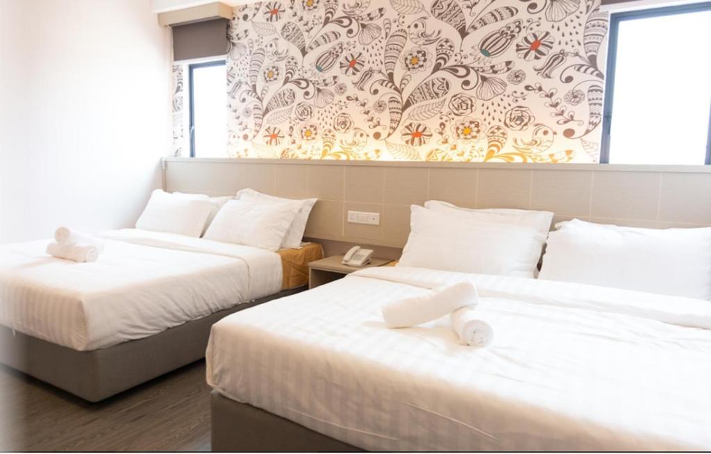 THE CROWN HOTEL @ KLIAにあるベッド