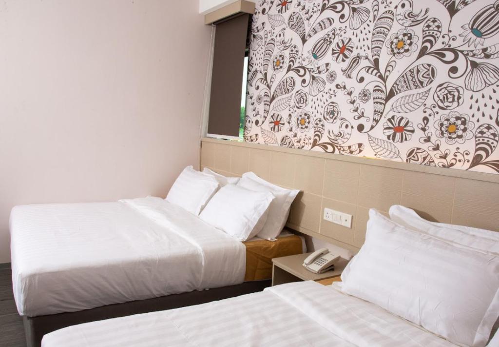 THE CROWN HOTEL @ KLIAにあるベッド