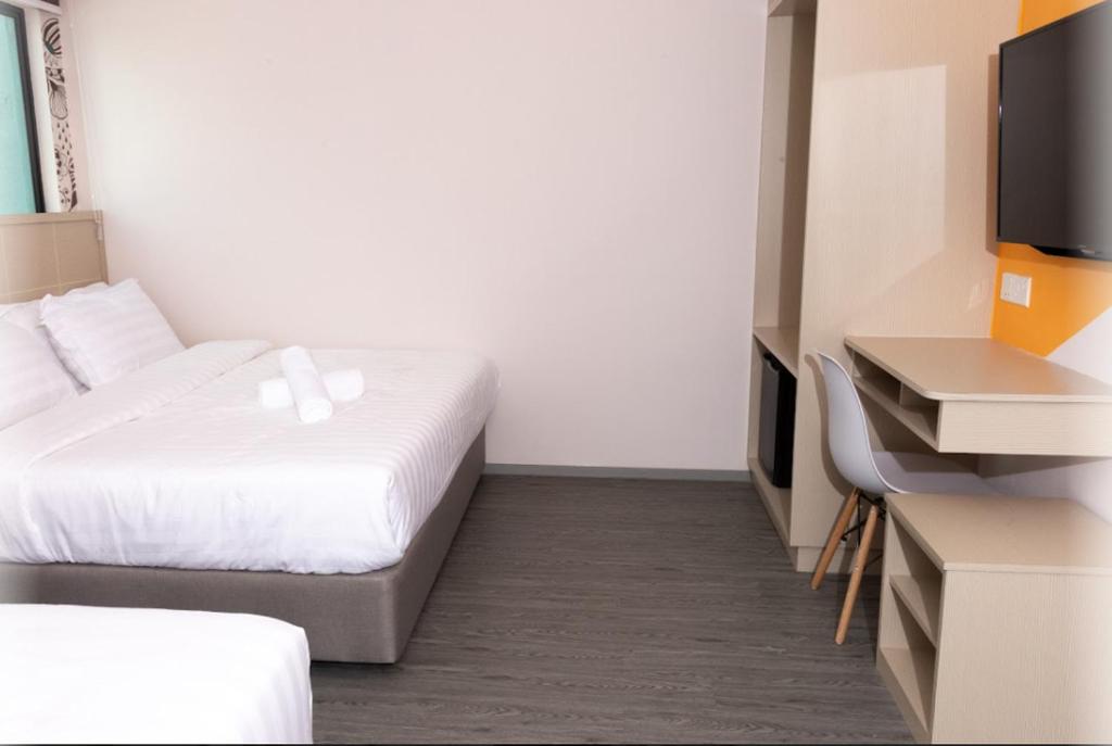 THE CROWN HOTEL @ KLIAにあるベッド