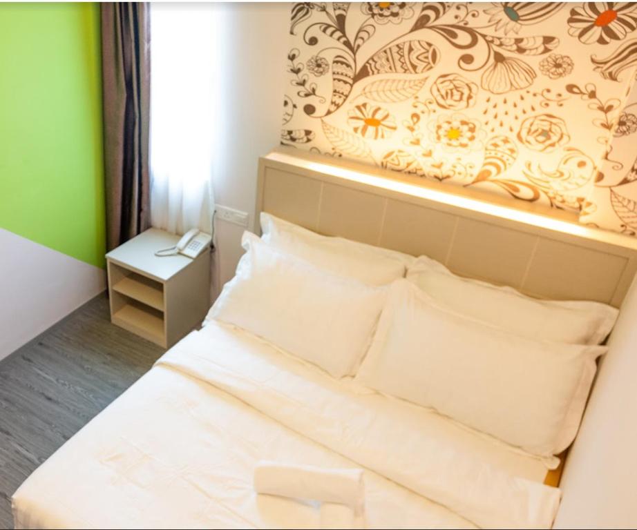 THE CROWN HOTEL @ KLIAにあるベッド