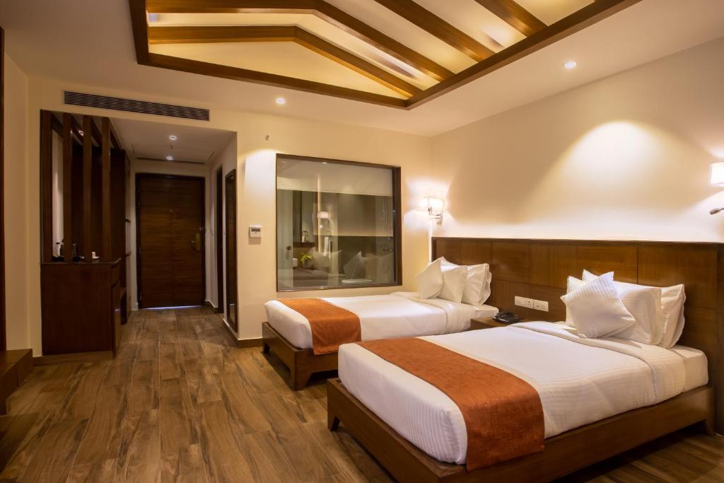 Letto o letti in una camera di Soaltee Westend Resort Chitwan