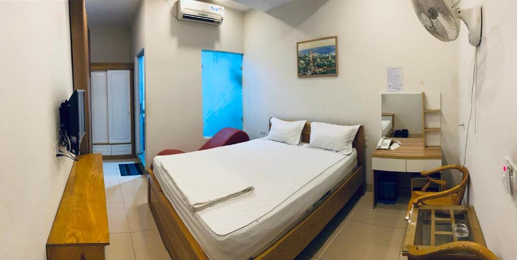 Giường trong phòng chung tại Đông Á Hotel Bắc Ninh