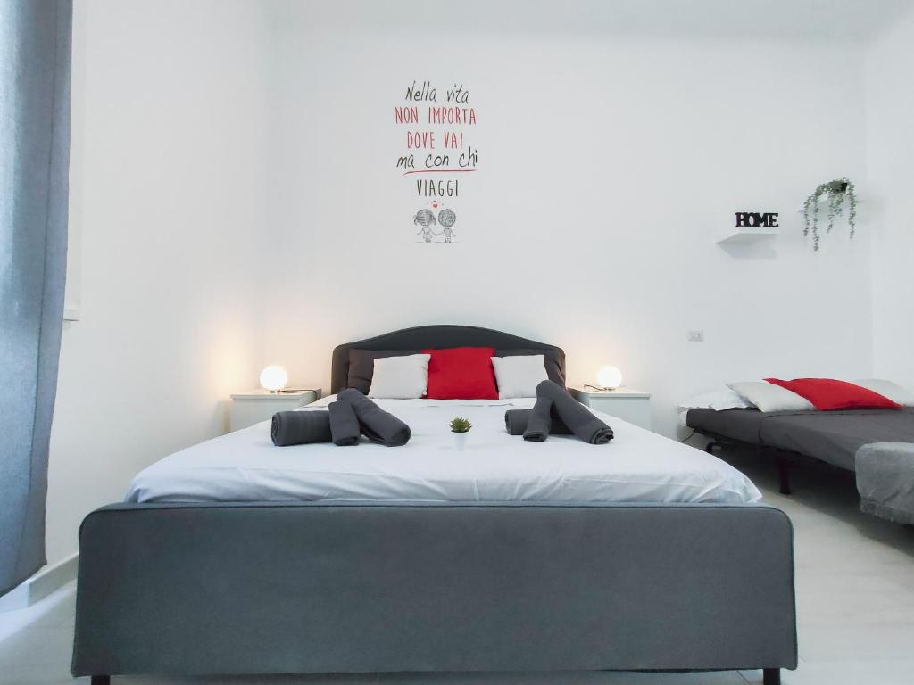 Łóżko lub łóżka w pokoju w obiekcie S&M Apartments "Casa Gemma" - Cimiano M2