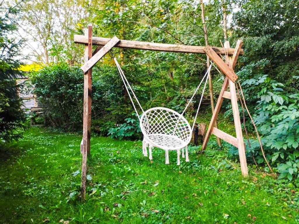 Vonkajšia záhrada v ubytovaní Garden House nad jeziorem Szelment