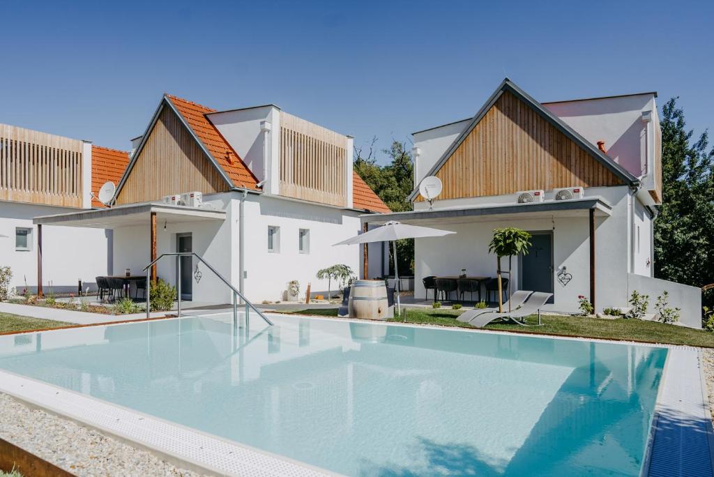 an image of a swimming pool in a house at Weinberg Chalet 2 in Eisenberg an der Pinka