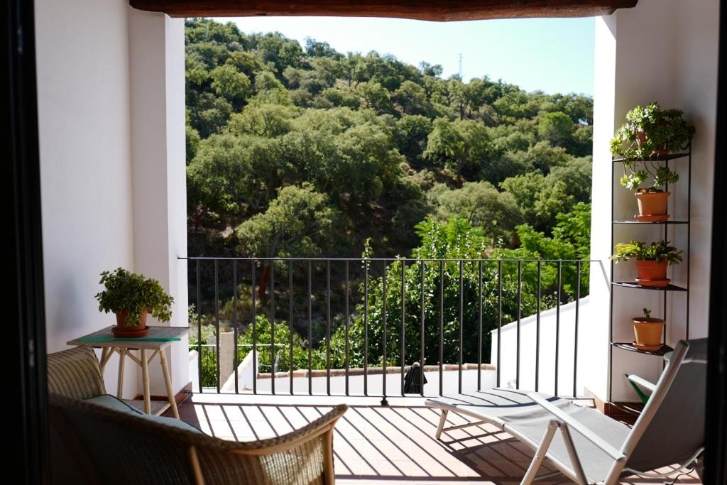 a balcony with a view of a mountain at Casa Antonio in Alájar