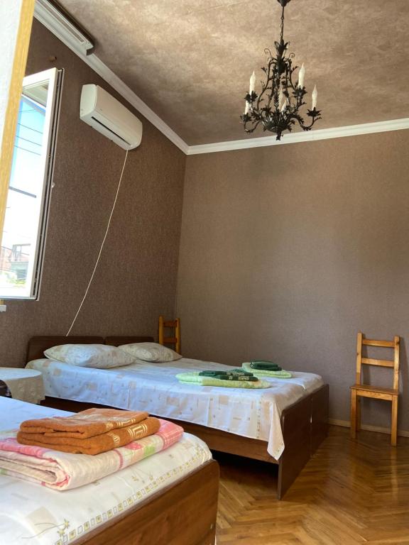 Postel nebo postele na pokoji v ubytování Уютный Дворик