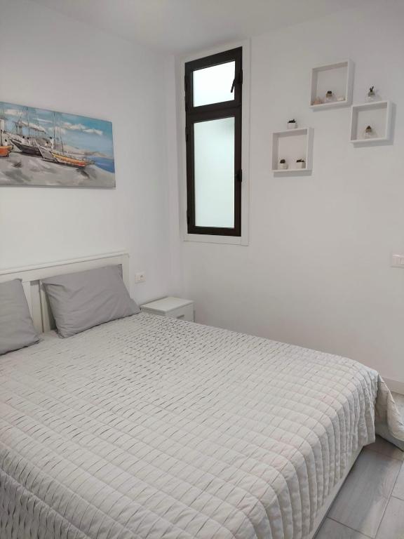 Postel nebo postele na pokoji v ubytování Bonny House Los Cristianos Sea View Free Wifi