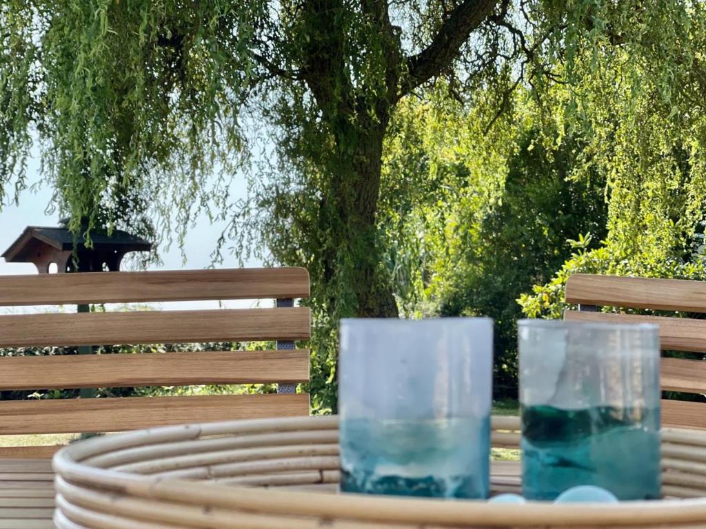 a table with two glasses on top of it at Deichquartier in Oesterdeichstrich