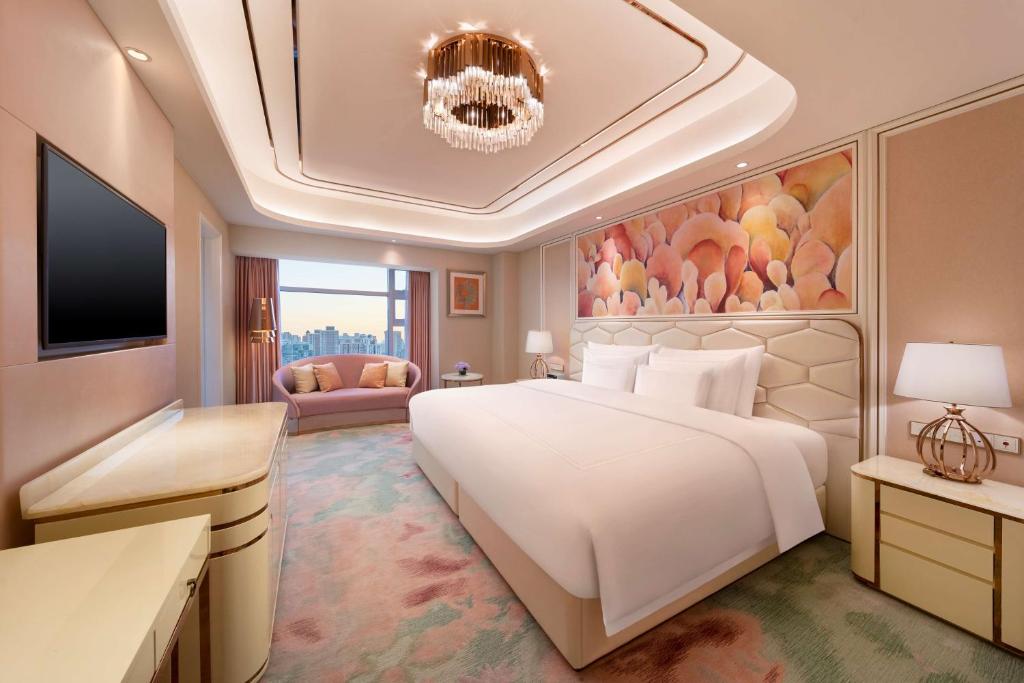 Postel nebo postele na pokoji v ubytování Radisson Collection Hotel, Xing Guo Shanghai