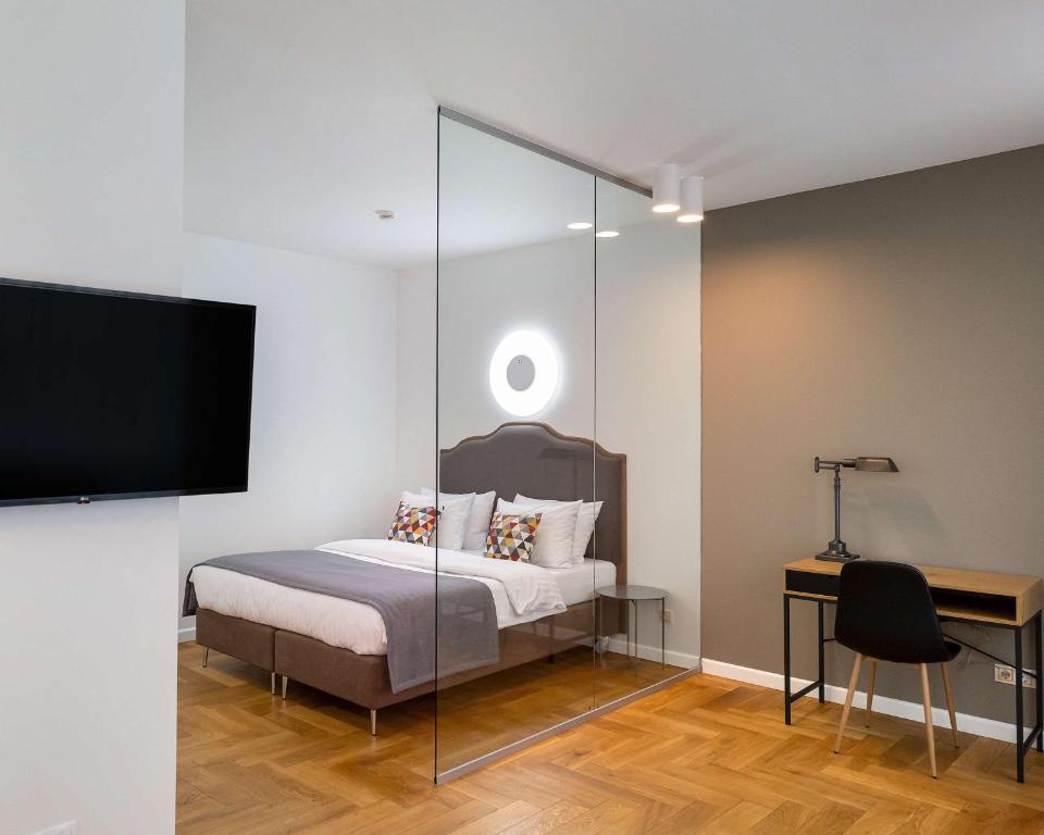 Postel nebo postele na pokoji v ubytování Best Western Plus Market Square Lviv