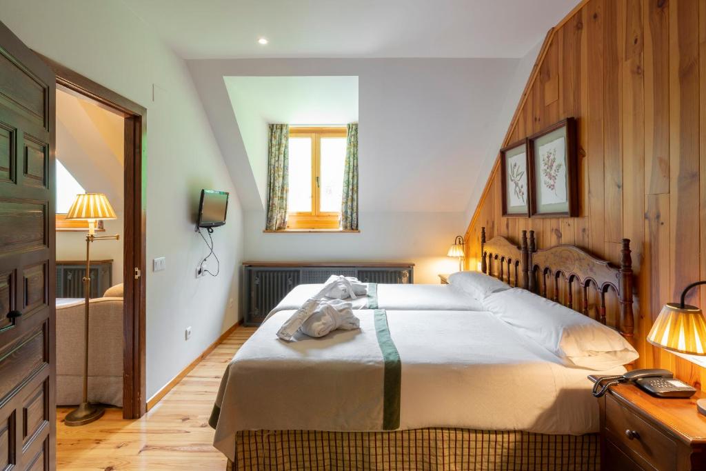 Cama o camas de una habitación en Parador de Bielsa