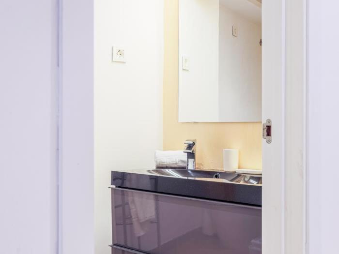 A kitchen or kitchenette at La muralla de Sevilla