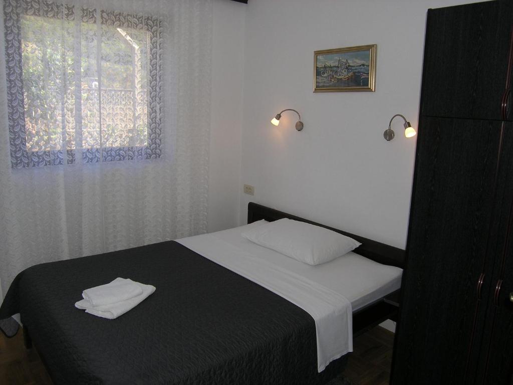 Posteľ alebo postele v izbe v ubytovaní Apartments Mari with terrace