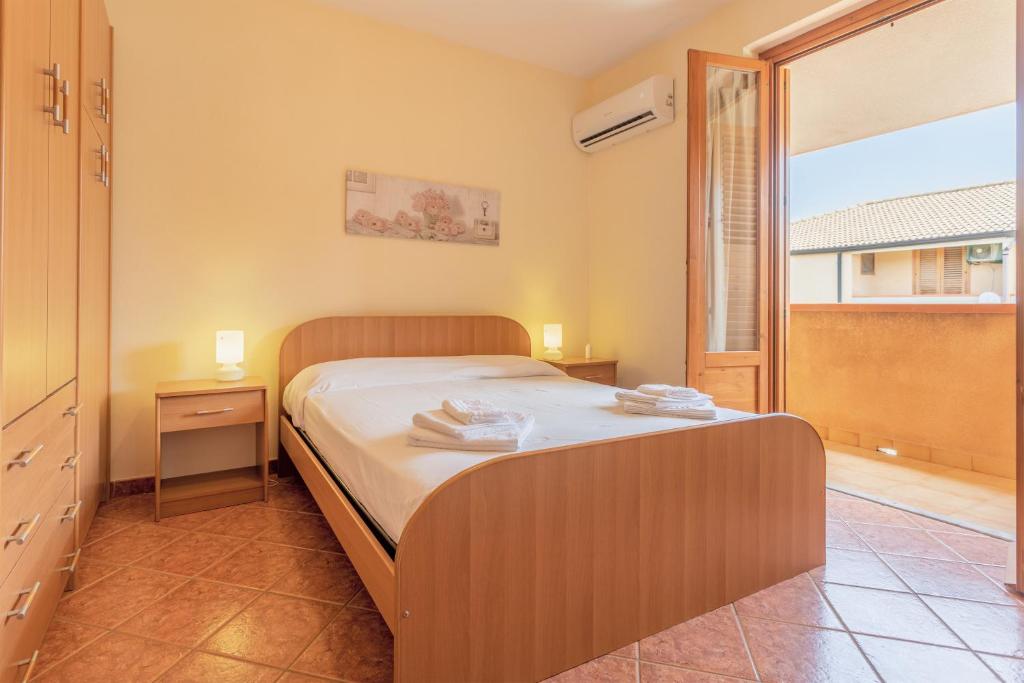 Posteľ alebo postele v izbe v ubytovaní San Carlo - private beach