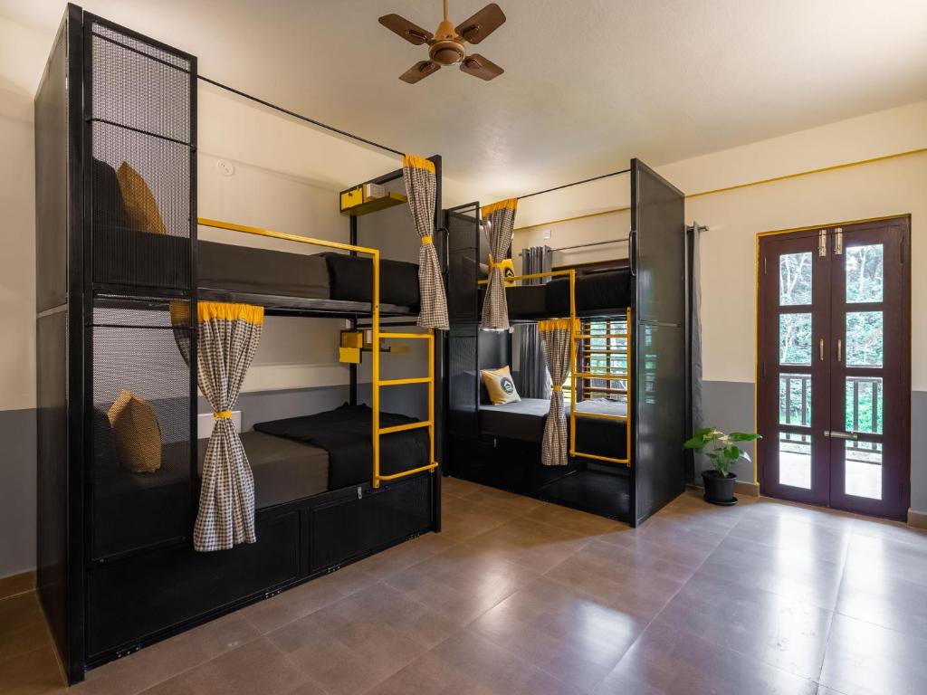 Voodi või voodid majutusasutuse The Hosteller Coorg Rainforest, Madikeri toas