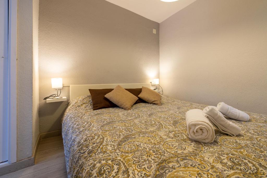 Postel nebo postele na pokoji v ubytování Precioso apartamento en Granada