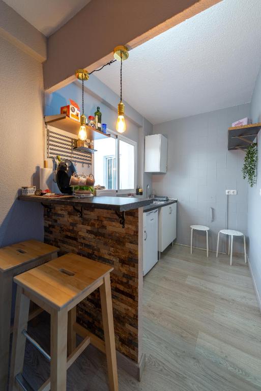 Kuchyň nebo kuchyňský kout v ubytování Precioso apartamento en Granada