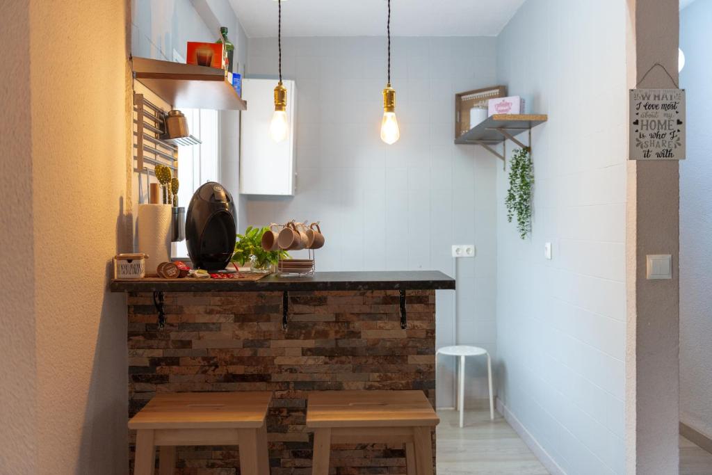 Kuchyň nebo kuchyňský kout v ubytování Precioso apartamento en Granada