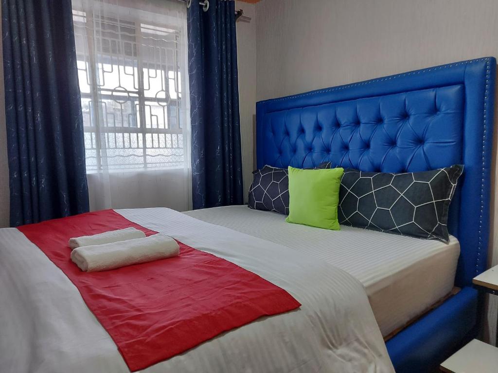 Postel nebo postele na pokoji v ubytování Parkview apartments