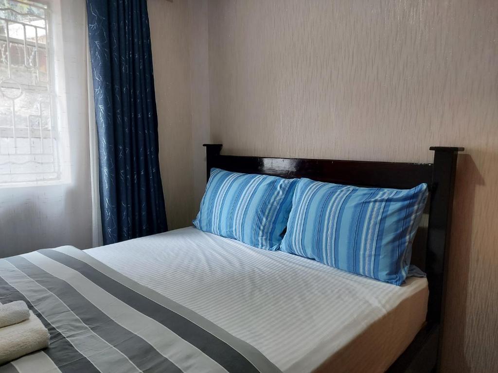 Postel nebo postele na pokoji v ubytování Parkview apartments